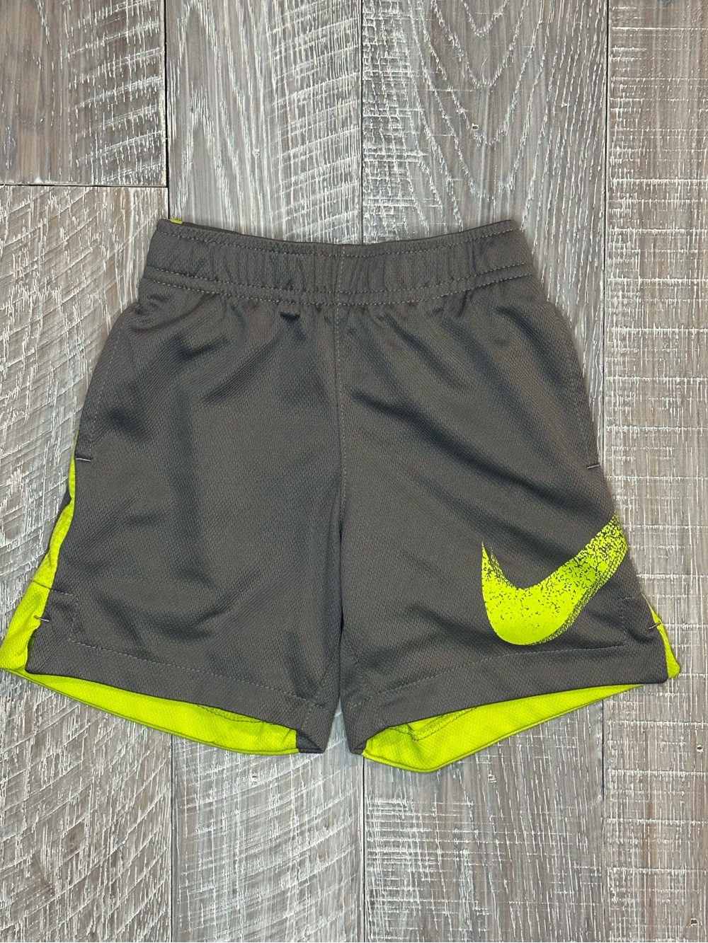 Nike Gray Shorts with Neon Yellow Volt Swoosh and Side Panels
